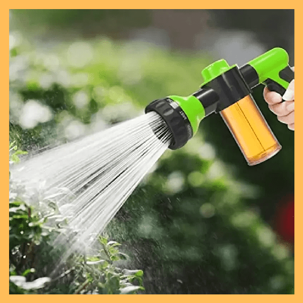 Handheld green adjustable spray nozzle for pet baths and gardening with soap dispenser