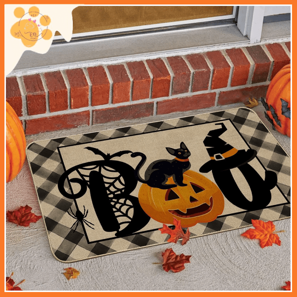 Halloween porch mat with BOO text, black cat, pumpkin, spider, and fall leaves by doorstep