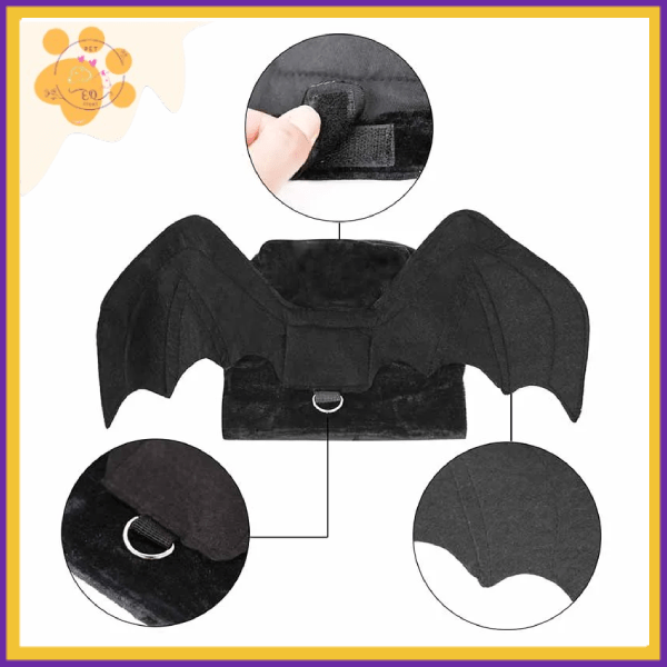 Close-up of black bat wings pet costume with velcro strap, D-ring, and stitching details