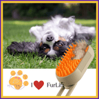 Happy dog lying on grass with FurLift grooming brush and pet store logo