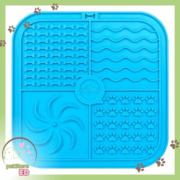 Blue slow feeder lick mat for dogs with paw and bone patterns, pet enrichment accessory