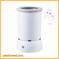 White compact dog paw washer with power button, pet store logo, and petstoreed.com text