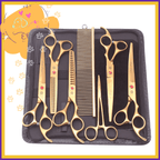 Gold pet grooming scissors set with comb in black case, professional grooming kit