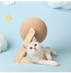 Gray cat with wooden and sisal rope scratching post, blue background, cloud decor