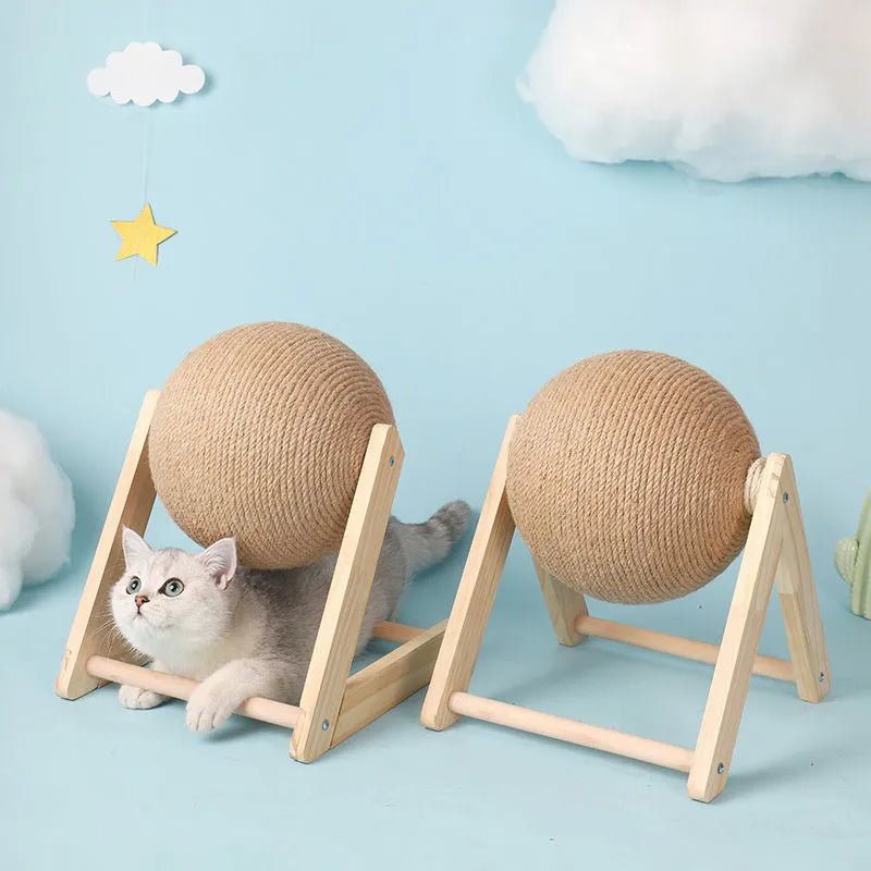 Gray cat with sisal rope scratching ball and wooden frame in a cute cloud-themed room
