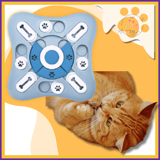 Interactive cat puzzle feeder toy with orange tabby cat on yellow background