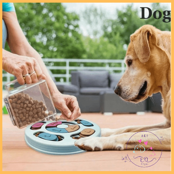 Dog using interactive puzzle feeder with kibble outdoors on patio