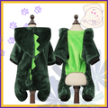 Plush green dinosaur dog costume on mannequins, pet clothing with hood and tail