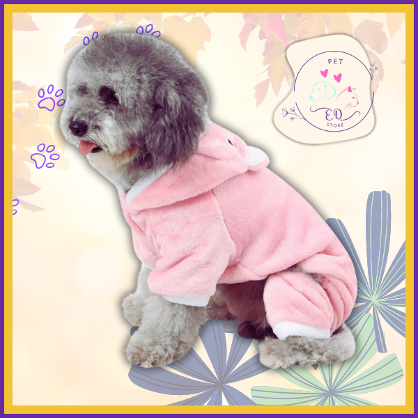 Grey poodle in a soft pink winter costume, providing warmth and style, ideal for chilly days