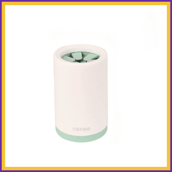 Portable green paw cleaner with soft bristles, white body, mint green base on white background