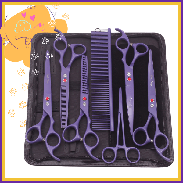 Purple pet grooming scissors kit with comb in black case, dog paw print background