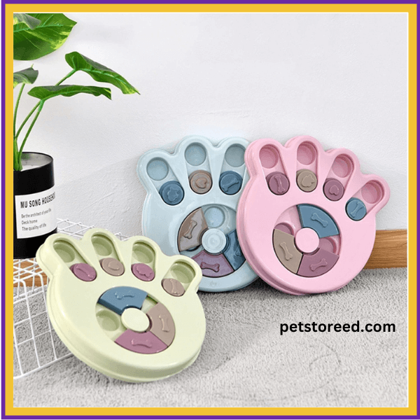 PuzzlePaws paw-shaped interactive pet feeders in pastel colors on gray carpet