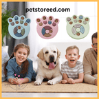 Family with dog beside interactive paw-shaped pet feeders, petstoreed.com branding visible.