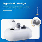 Ergonomic pet spray brush with comfortable grip for cat grooming, blue background.