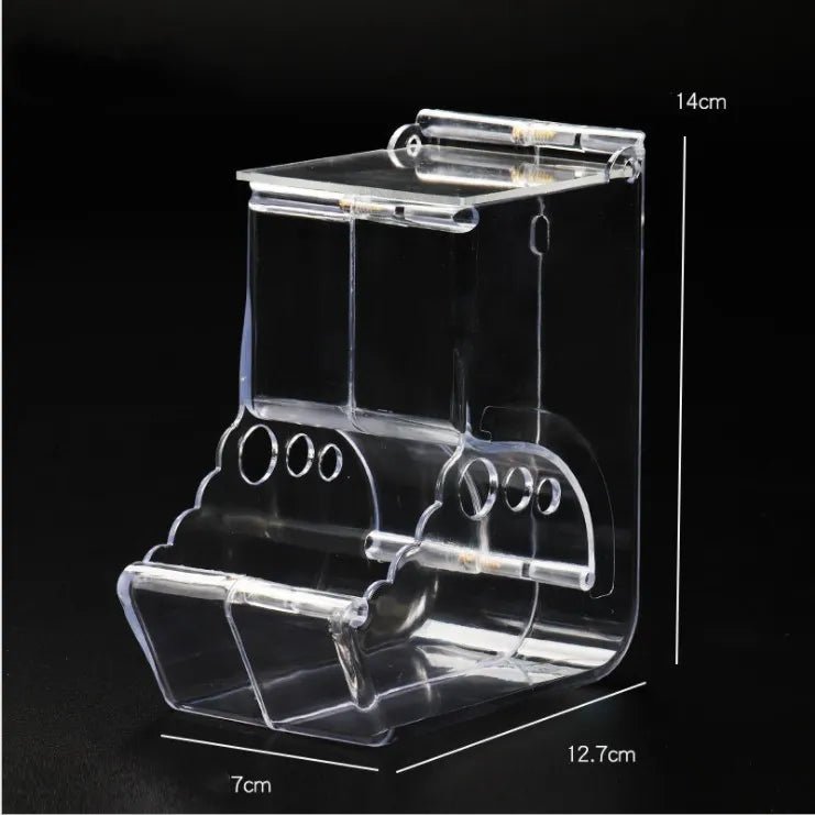 Clear acrylic bird feeder with suction cups, 14x12.7x7cm, on black background.