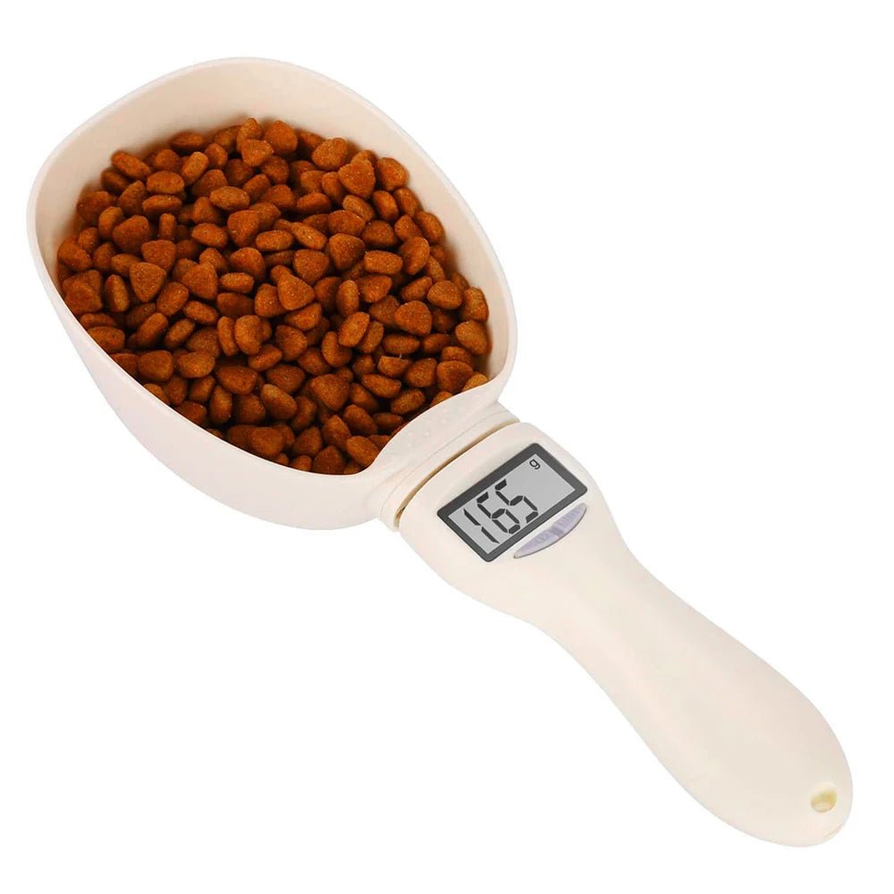 Digital pet food scoop with kibble and LCD weight display on white background