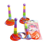 Colorful plastic ring toss game set with rainbow striped cones and rings