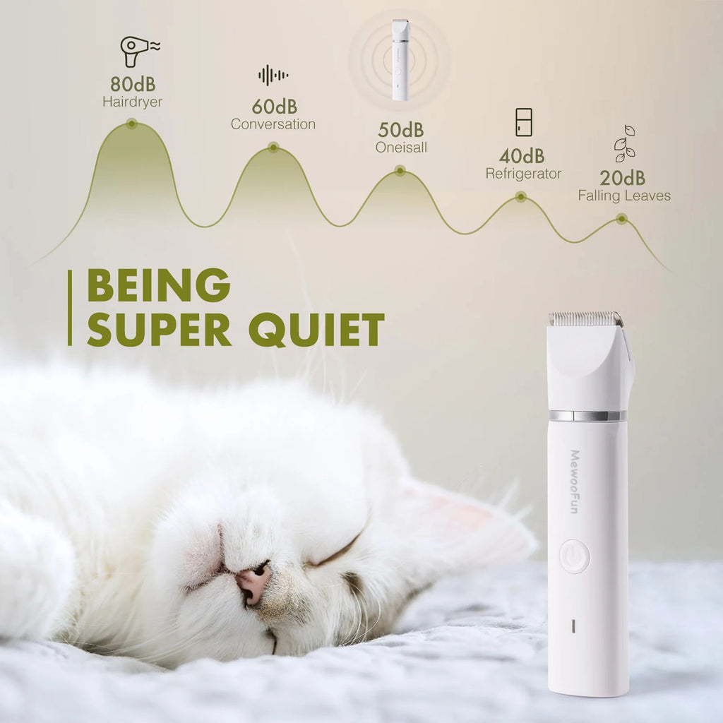 White cat sleeping peacefully with MewooFun quiet pet clipper, noise level comparison chart in background
