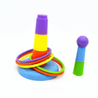 Colorful plastic ring toss game with stacked cones and multicolored rings on white background