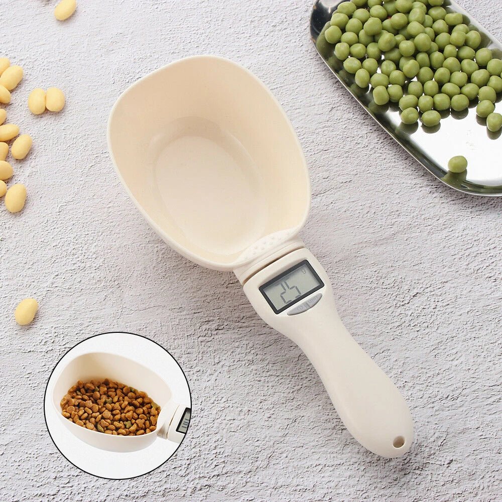 Digital measuring scoop with LCD display for pet food and beans on textured surface