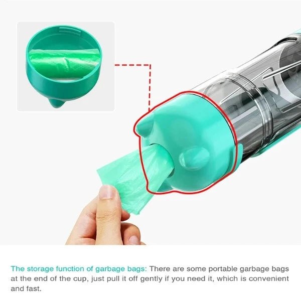 Portable vacuum with built-in garbage bag storage in teal color being dispensed by hand
