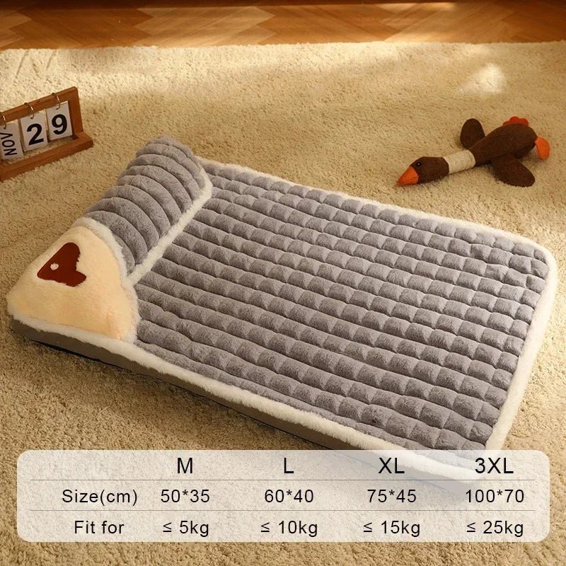Gray plush pet bed with heart detail on beige carpet, plush goose toy, size chart overlay