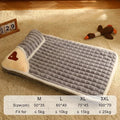Gray plush pet bed with heart detail on beige carpet, plush goose toy, size chart overlay