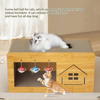 Cats playing with wooden cat scratcher house toy with hanging bell balls in living room.