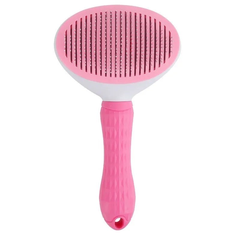 Pink pet grooming brush with textured handle and fine bristles, isolated on white background