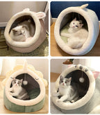 Four cats lounging in plush animal-shaped cat beds with cozy interiors.