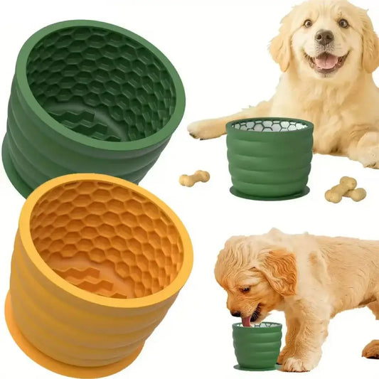 Happy puppy using SnugBowl silicone feeder with dog treats