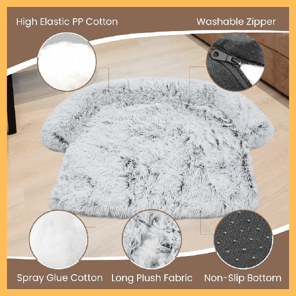Gray plush pet bed on wood floor with fabric details: high elastic PP cotton, washable zipper, spray glue cotton, long plush fabric, and non-slip bottom.