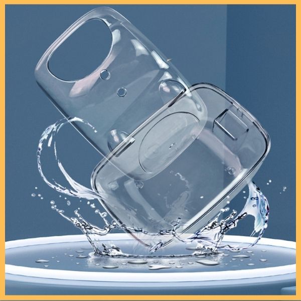 Clear waterproof hamster sand bath container splashing into water on blue background