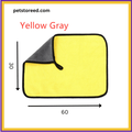 Yellow and gray fluffy towel 30x60 cm with black trim from petstoreed.com