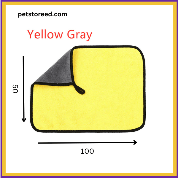 Yellow gray fluffy towel 50x100 cm with black trim, corner flipped to show both sides