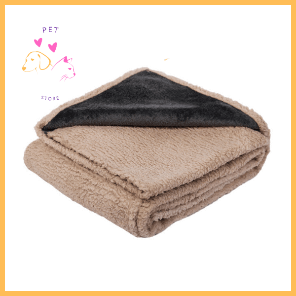 Folded beige waterproof dog blanket with soft fleece texture and black lining