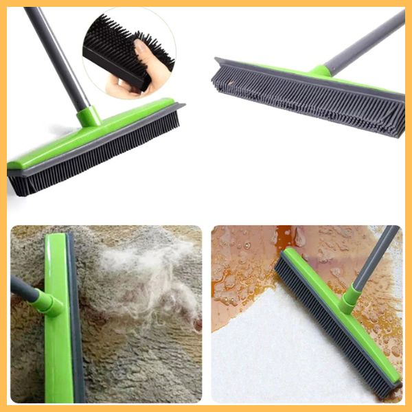 Rubber broom with green handle cleaning pet hair from carpet and liquid from hard surfaces