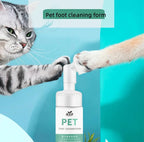 Cat paw being cleaned with pet foot cleansing foam against a blue background