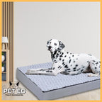 Dalmatian dog lying on orthopedic pet bed in modern living room, PET ED accessories logo visible