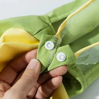 Stitching and snap system on full body rain gear