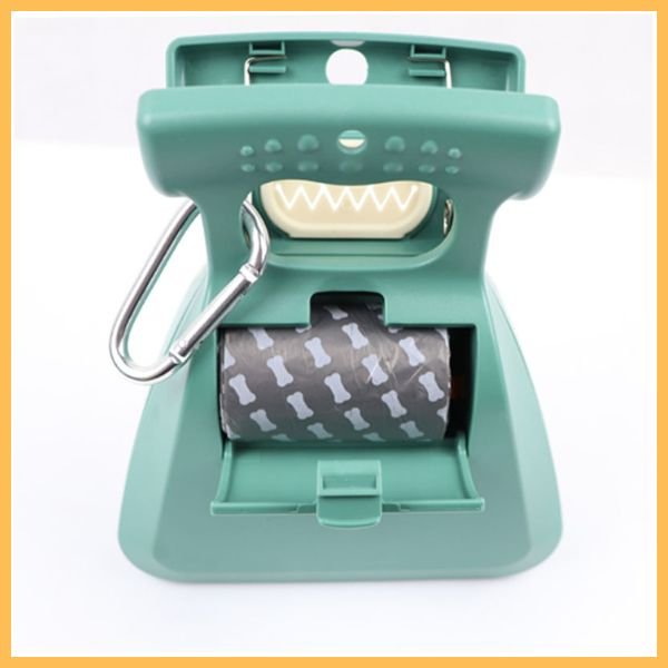 Green dog poop scooper with waste bag compartment and carabiner clip