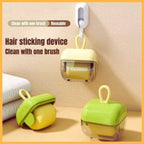 Reusable mini hair roller device in green and yellow, compact design, hanging on wall hook