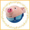 Interactive dog toy plush ball in pig design with blue overalls and music note border