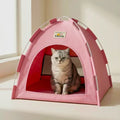 Indoor pink cat cave tent next to window — soft breathable hideout for calm and relaxed cats