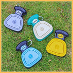 Colorful poop scoopers for pets on grass, multi-color pet waste scoopers outdoor
