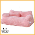 Soft pink plush cat and dog bed with bolstered sides and PET ED branding