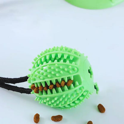 Green textured ball of TugBite, the perfect dog toy to relieve boredom.