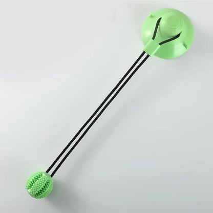 Green dog chew toy suction cup to relieve boredom and stress.