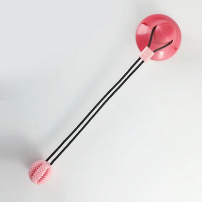 Red TugBite suction cup dog toy perfect for active chewing fun.