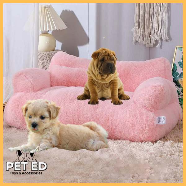 Two dogs on a pink plush pet bed in a cozy indoor room, Pet ED branding visible